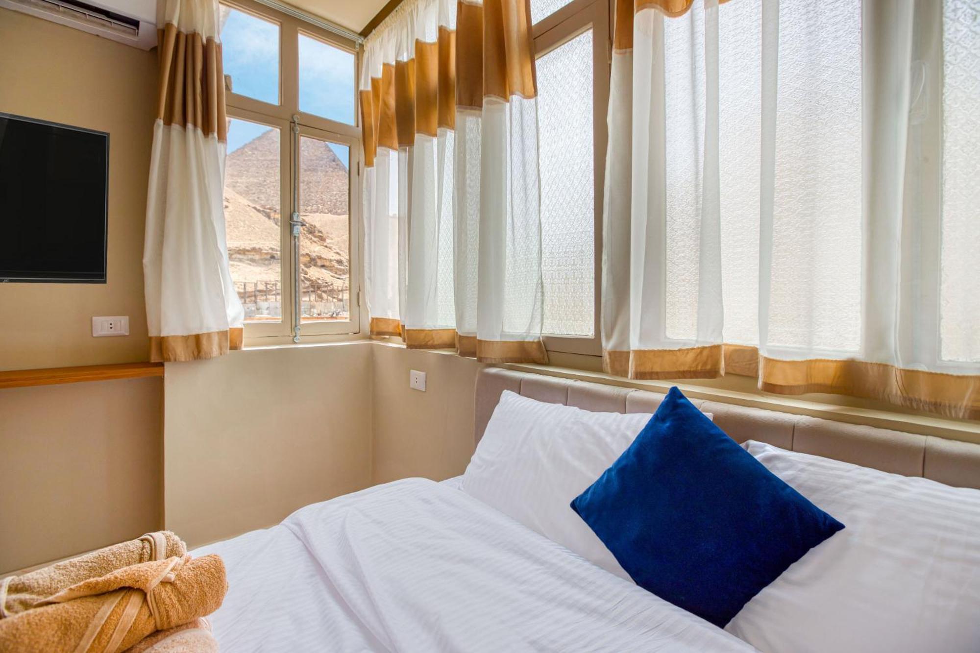 The Grand Pyramids View Hotel Kafret el-Gabal Værelse billede