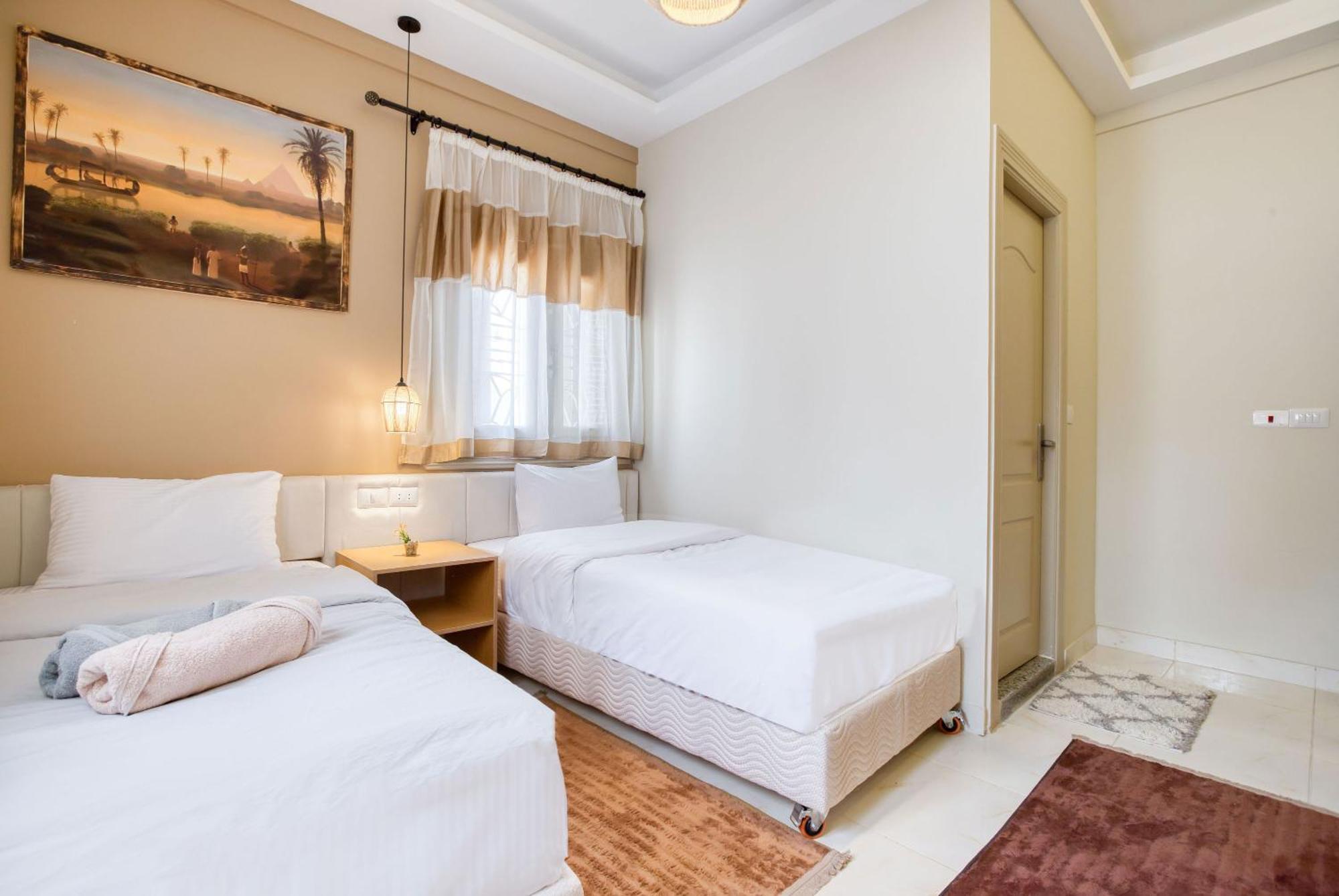 The Grand Pyramids View Hotel Kafret el-Gabal Værelse billede